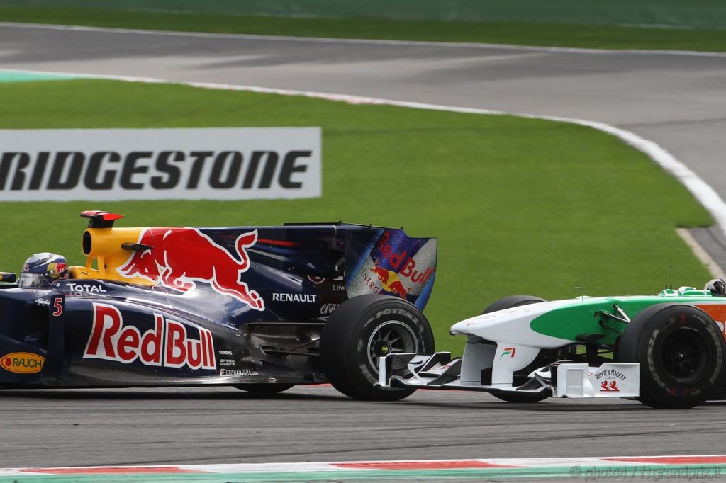 GP Belgio, Gara, Sebastian Vettel (GER), Red Bull Racing, RB6 e Vitantonio Liuzzi (ITA), Force India F1 Team, VJM03 