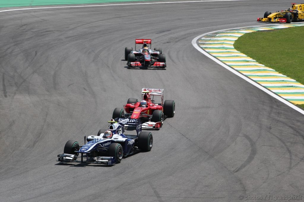 GP Brasile, Gara, Nico Hulkenberg (GER), Williams, FW32 e Fernando Alonso (ESP), Ferrari, F10 