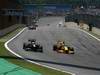 GP Brasile, Gara, Heikki Kovalainen (FIN), Lotus Racing, T127 e Vitaly Petrov (RUS), Renault F1 Team, R30 