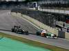 GP Brasile, Gara, Jarno Trulli (ITA), Lotus Racing, T127 e Adrian Sutil (GER), Force India F1 Team, VJM03 
