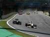 GP Brasile, Gara, Heikki Kovalainen (FIN), Lotus Racing, T127 e Adrian Sutil (GER), Force India F1 Team, VJM03 