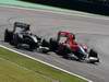GP Brasile, Gara, Jarno Trulli (ITA), Lotus Racing, T127 e Lucas Di Grassi (BRA), Virgin Racing, VR-01 