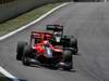 GP Brasile, Gara, Timo Glock (GER), Virgin Racing, VR-01  e Jarno Trulli (ITA), Lotus Racing, T127 