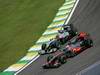 GP Brasile, Gara, Jenson Button (GBR), McLaren  Mercedes, MP4-25 e Michael Schumacher (GER), Mercedes GP  F1 Team, MGP W01 