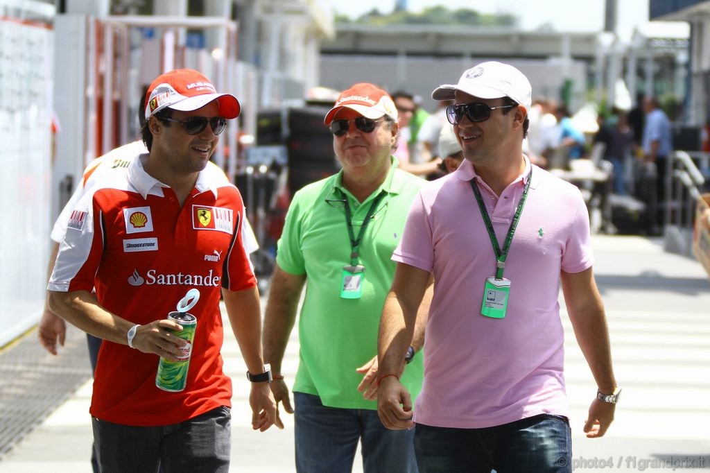GP Brasile, Giovedi', Felipe Massa (BRA), Ferrari, F10 with his father Luis Antonio Massa (BRA) e his brother Dudu
