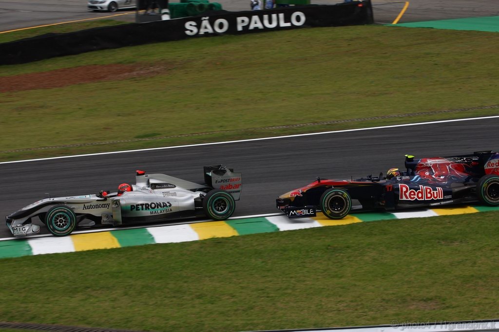 GP Brasile, Prove Libere 2, Venerdi', Michael Schumacher (GER), Mercedes GP  F1 Team, MGP W01 e Jaime Alguersuari (SPA), Scuderia Toro Rosso, STR5 