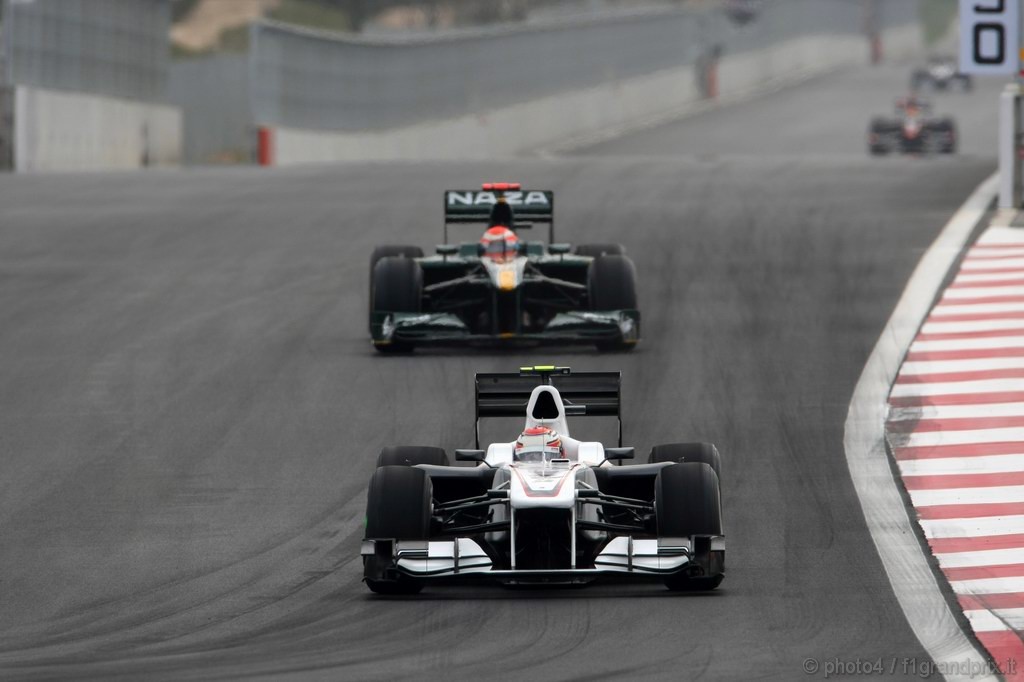 GP Corea, Prove Libere 3, Sabato, Kamui Kobayashi (JAP), BMW Sauber F1 Team, C29 e Jarno Trulli (ITA), Lotus Racing, T127 