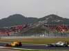 GP Corea, Prove Libere 3, Sabato, Vitaly Petrov (RUS), Renault F1 Team, R30 davanti a Nico Rosberg (GER), Mercedes GP F1 Team, MGP W01 