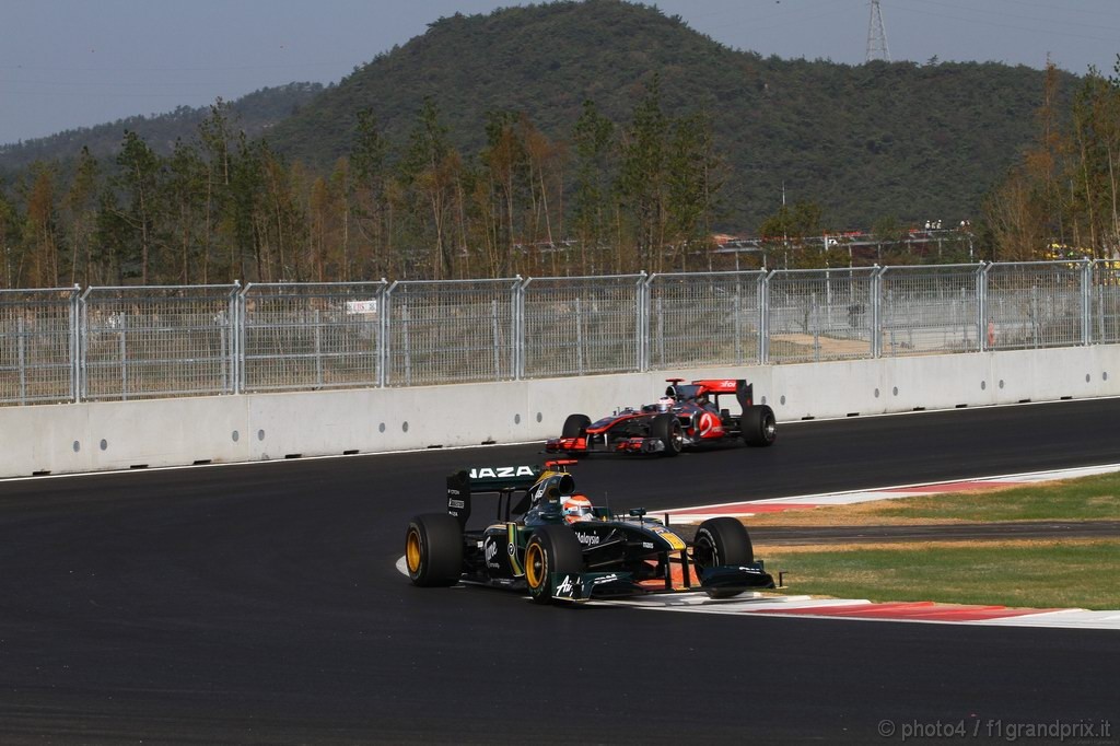 GP Corea, Prove Libere 1, Venerdi', Jarno Trulli (ITA), Lotus Racing, T127 e Jenson Button (GBR), McLaren  Mercedes, MP4-25 