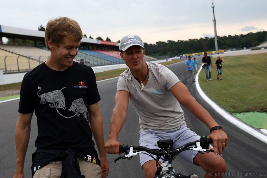 GP Germania, Giovedi', Michael Schumacher (GER), Mercedes GP  F1 Team, MGP W01 e Sebastian Vettel (GER), Red Bull Racing, RB6 