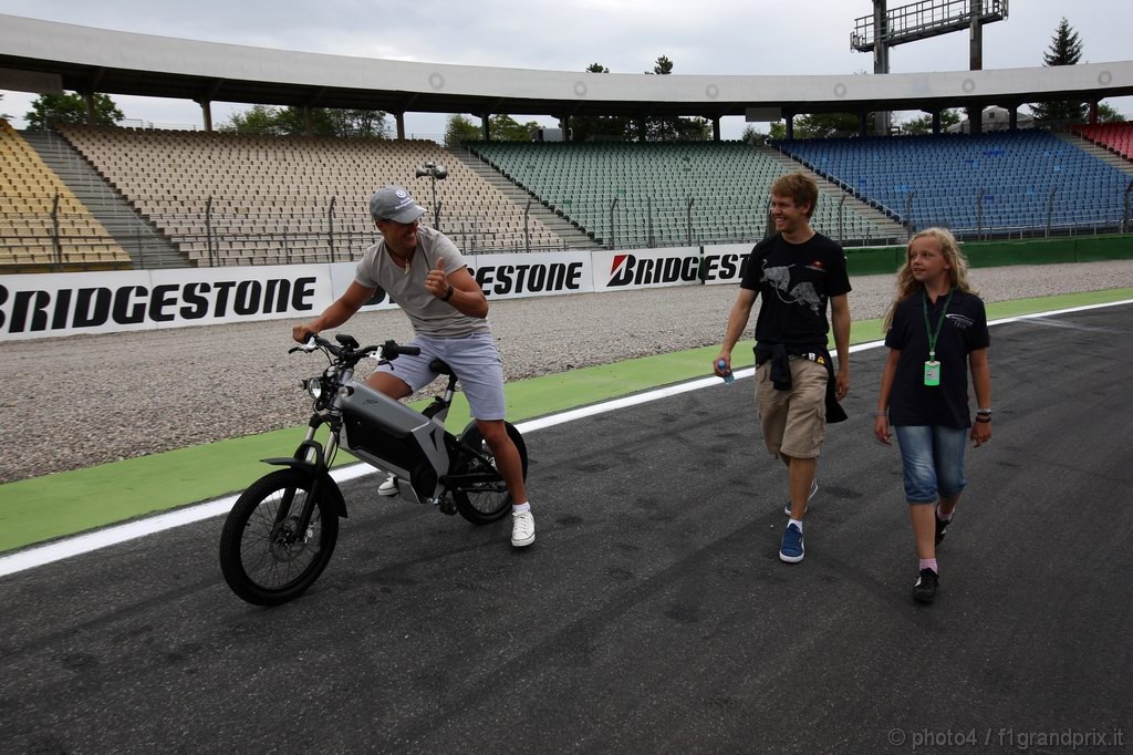 GP Germania, Giovedi', Michael Schumacher (GER), Mercedes GP  F1 Team, MGP W01 e Sebastian Vettel (GER), Red Bull Racing, RB6 