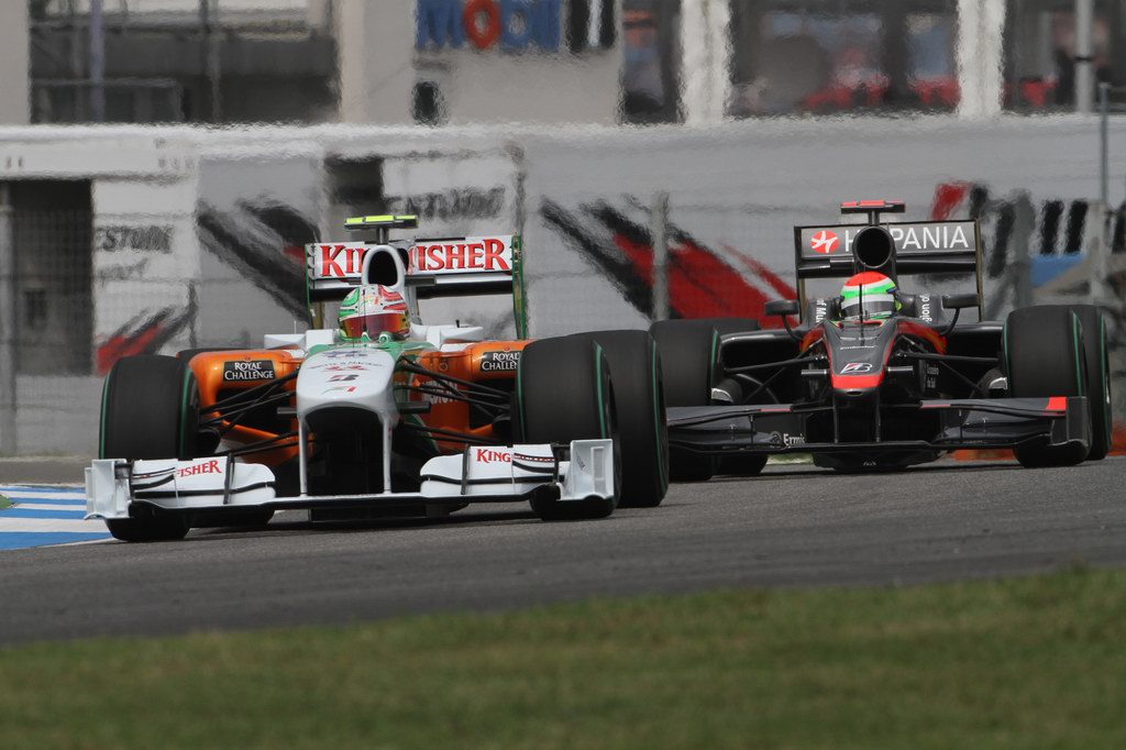 GP Germania, Prove Libere 3, Sabato, Vitantonio Liuzzi (ITA), Force India F1 Team, VJM03 davanti a Sakon Yamamoto (JPN), Hispania Racing F1 Team (HRT), F110  
