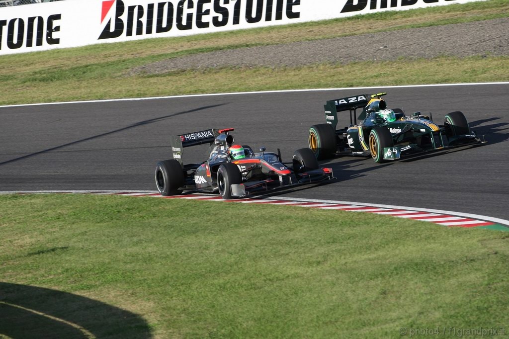GP Giappone, Gara, Sakon Yamamoto (JPN), Hispania Racing F1 Team (HRT), F110 e Heikki Kovalainen (FIN), Lotus Racing, T127