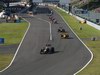 GP Giappone, Gara, Sebastian Vettel (GER), Red Bull Racing, RB6 davanti a Robert Kubica (POL), Renault F1 Team, R30 