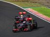 GP Giappone, Gara, Jenson Button (GBR), McLaren  Mercedes, MP4-25 davanti a Lewis Hamilton (GBR), McLaren  Mercedes, MP4-25 
