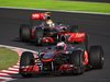 GP Giappone, Gara, Jenson Button (GBR), McLaren  Mercedes, MP4-25 davanti a Lewis Hamilton (GBR), McLaren  Mercedes, MP4-25 