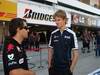 GP Giappone, Giovedi', Timo Glock (GER), Virgin Racing, VR-01 e Nick Heidfeld (GER), BMW Sauber F1 Team, C29  