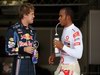 GP Giappone, Domenica, Qualifiche, Lewis Hamilton (GBR), McLaren Mercedes, MP4-25 e Sebastian Vettel (GER), Red Bull Racing, RB6
