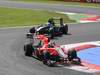GP Italia, Gara, Lucas Di Grassi (BRA), Virgin Racing, VR-01 davanti a Heikki Kovalainen (FIN), Lotus Racing, T127