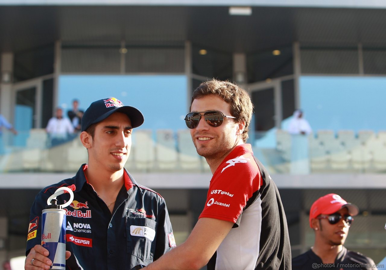 GP ABU DHABI, 13.11.2011- Sébastien Buemi (SUI), Scuderia Toro Rosso, STR6 e Jerome D'Ambrosio (BEL), Marussia Virgin Racing VR-02 at drivers parade  