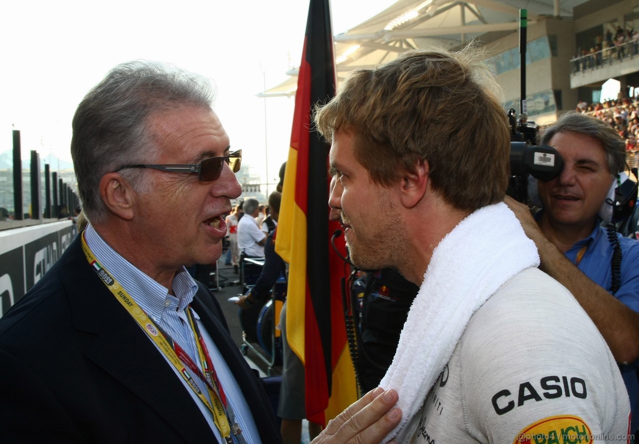GP ABU DHABI, 13.11.2011- Gara, Piero Ferrari (ITA), vice-president Ferrari  e Sebastian Vettel (GER), Red Bull Racing, RB7 