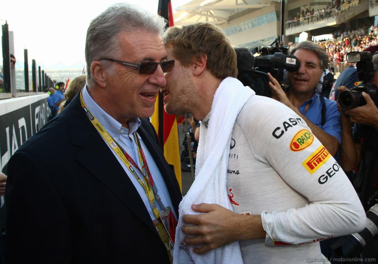 GP ABU DHABI, 13.11.2011- Gara, Piero Ferrari (ITA), vice-president Ferrari  e Sebastian Vettel (GER), Red Bull Racing, RB7 