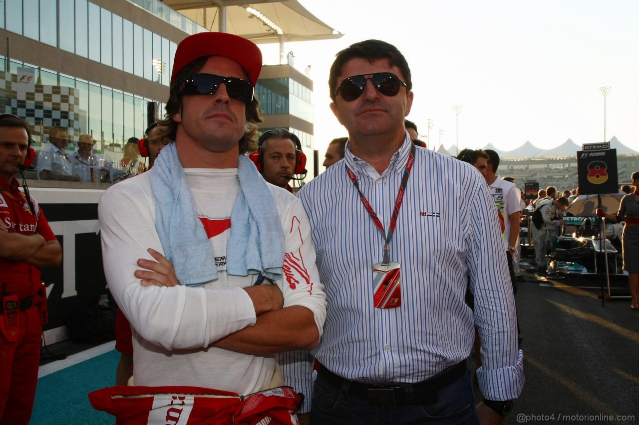 GP ABU DHABI, 13.11.2011- Gara, Fernando Alonso (ESP), Ferrari, F-150 Italia e his manager Luis Garcia Abad (ESP)