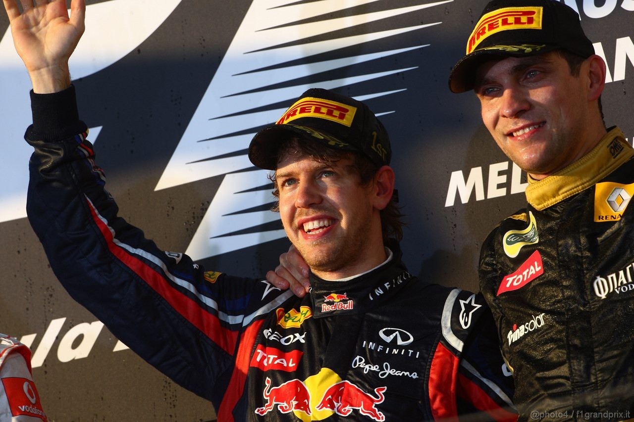 GP AUSTRALIA, 27.03.2011- Gara, Sebastian Vettel (GER), Red Bull Racing, RB7 vincitore e Vitaly Petrov (RUS), Lotus Renault GP, R31 terzo 