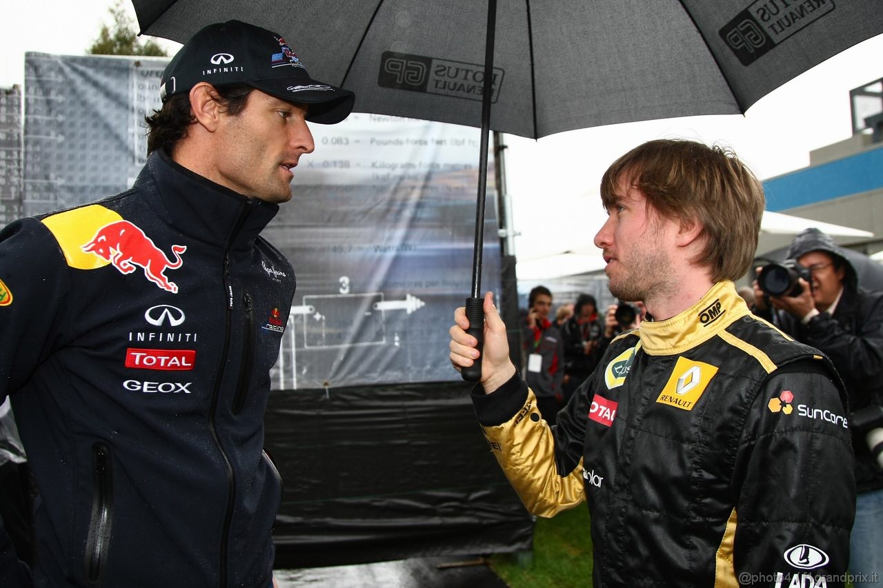 GP AUSTRALIA, 24.03.2011- Mark Webber (AUS), Red Bull Racing, RB7 e Nick Heidfeld (GER) Lotus Renault GP R31  