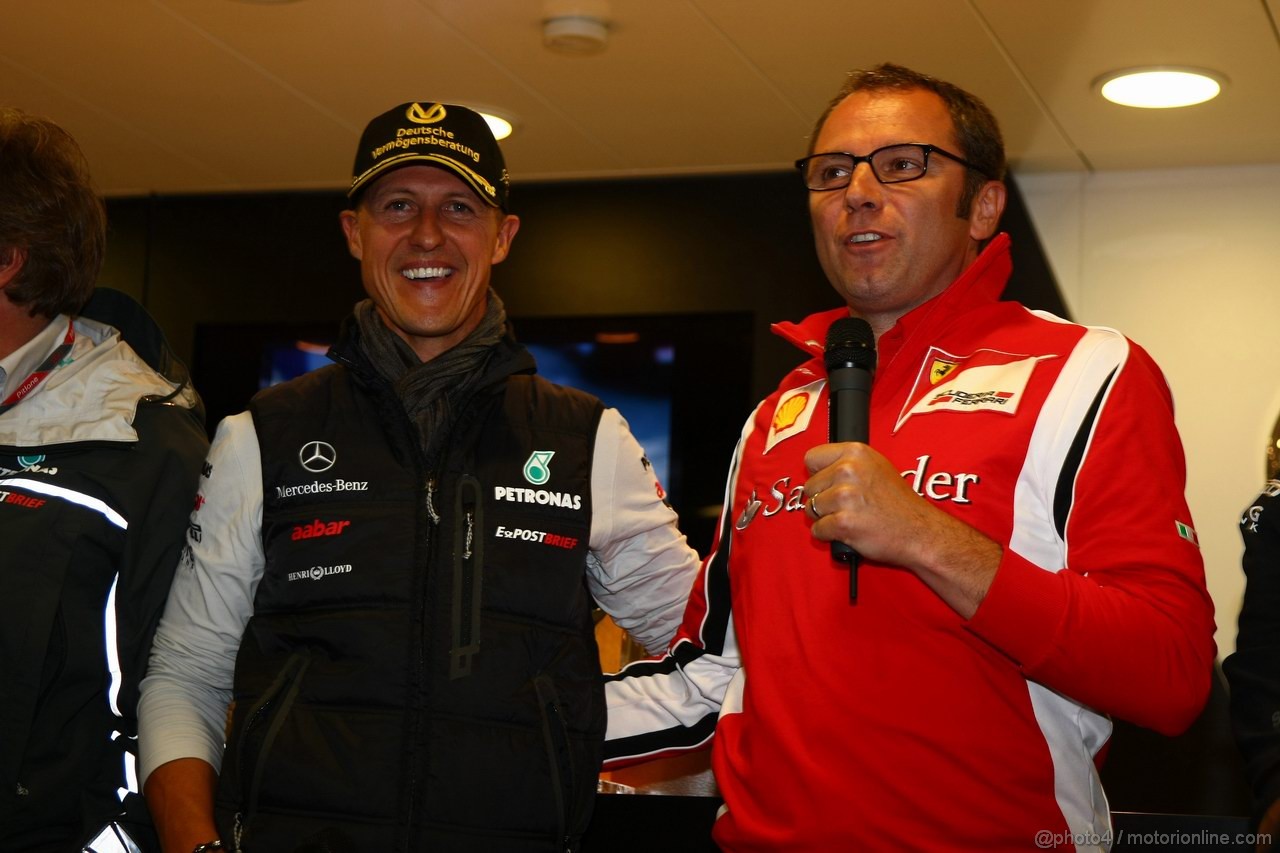 GP BELGIO, 27.08.2011- Michael Schumacher (GER), Mercedes GP Petronas F1 Team celebrates his first F1 drive at Spa 20 years ago with Stefano Domenicali (ITA), Team Principal 