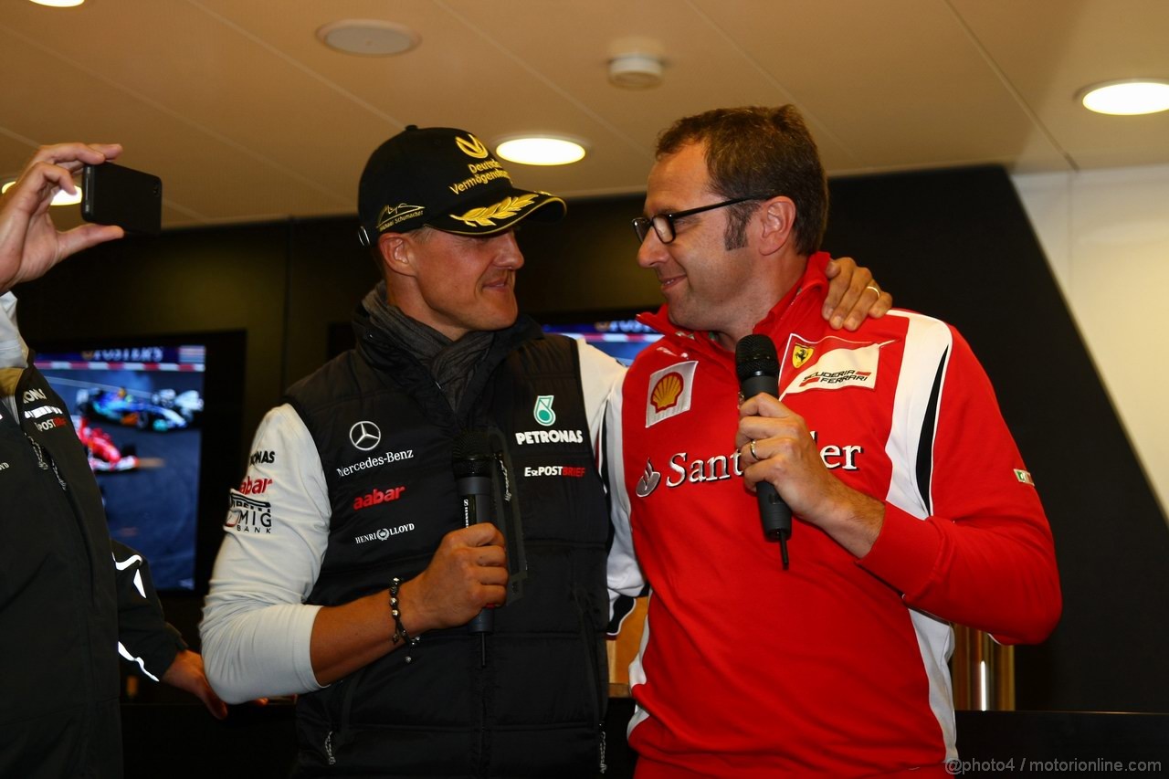 GP BELGIO, 27.08.2011- Michael Schumacher (GER), Mercedes GP Petronas F1 Team celebrates his first F1 drive at Spa 20 years ago with Stefano Domenicali (ITA), Team Principal 