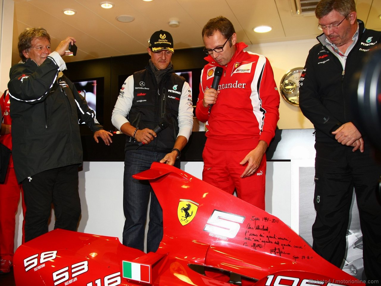 GP BELGIO, 27.08.2011- Michael Schumacher (GER), Mercedes GP Petronas F1 Team celebrates his first F1 drive at Spa 20 years ago with Stefano Domenicali (ITA), Team Principal , Norbert Haug (GER), Motorsport chief e Ross Brawn (GBR), Team Principal, Mercedes GP 