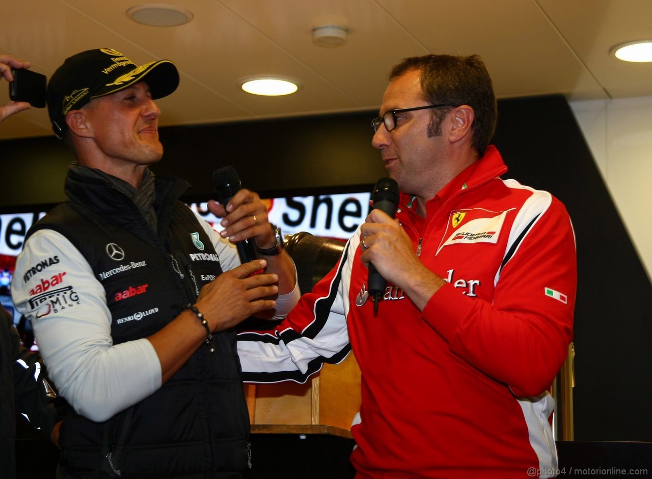 GP BELGIO, 27.08.2011- Michael Schumacher (GER), Mercedes GP Petronas F1 Team celebrates his first F1 drive at Spa 20 years ago with Stefano Domenicali (ITA), Team Principal 