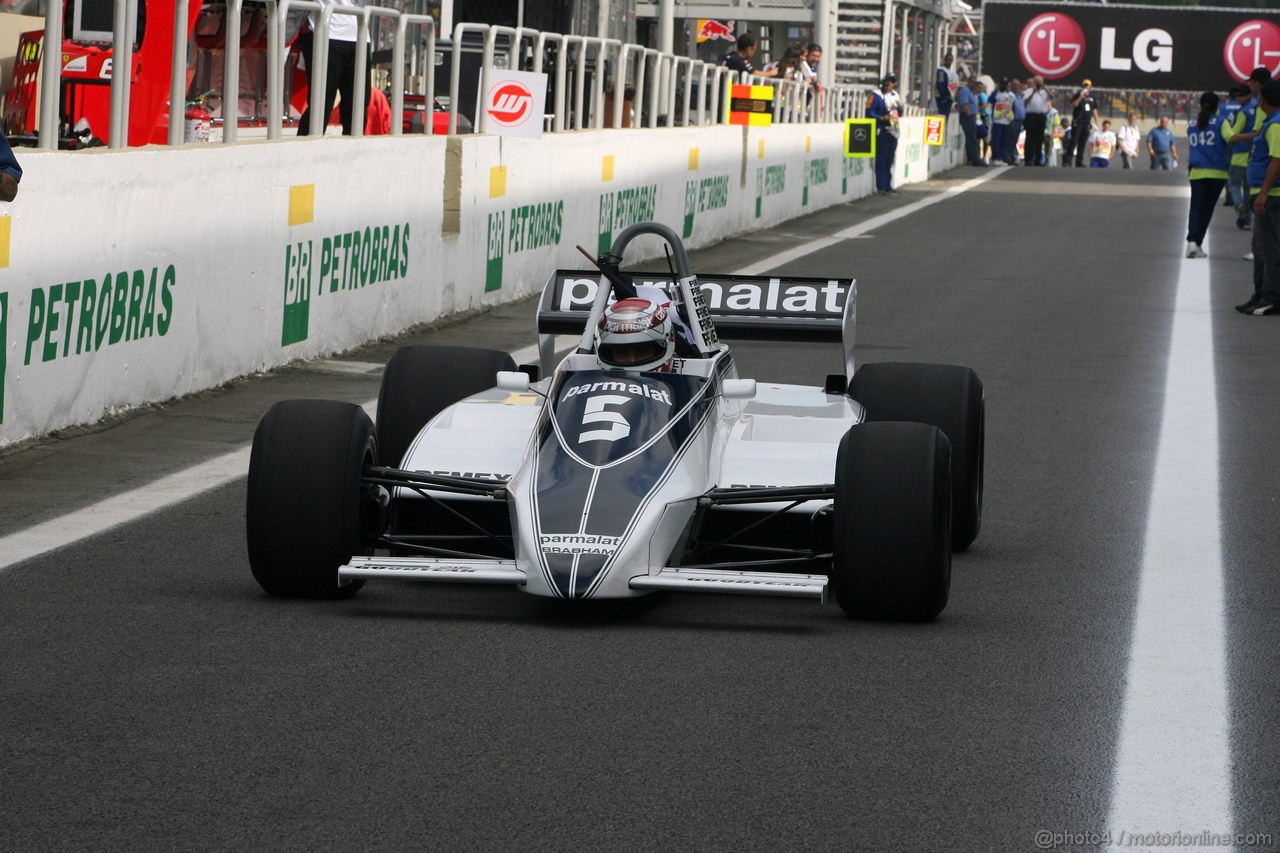 GP BRASILE, 27.11.2011- Nelson Piquet (BRA) with his 1981 championship winning Brabham BT49C
