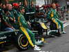 GP BRASILE, 27.11.2011- Team picture, Jarno Trulli (ITA), Team Lotus, TL11 e Heikki Kovalainen (FIN), Team Lotus, TL11 