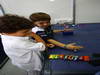 GP BRASILE, 27.11.2011- Fernando Barrichello, son of Rubens Barrichello (BRA), Williams FW33 with the son of Ronaldo, Ex Soccer