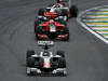 GP BRASILE, 27.11.2011- Gara, Vitantonio Liuzzi (ITA), HRT Formula One Team, Timo Glock (GER), Marussia Virgin Racing VR-02 e Daniel Ricciardo (AUS), HRT Formula One Team 
