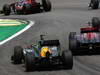 GP BRASILE, 27.11.2011- Gara, Heikki Kovalainen (FIN), Team Lotus, TL11 e Jaime Alguersuari (SPA), Scuderia Toro Rosso, STR6 