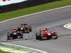 GP BRASILE, 27.11.2011- Gara, Jerome D'Ambrosio (BEL), Marussia Virgin Racing VR-02, Jaime Alguersuari (SPA), Scuderia Toro Rosso, STR6 e Vitaly Petrov (RUS), Lotus Renault GP, R31 