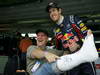 GP BRASILE, 26.11.2011- Sebastian Vettel (GER), Red Bull Racing, RB7 with a fan