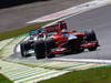 GP BRASILE, 25.11.2011- Prove Libere 1, Venerdi', Timo Glock (GER), Marussia Virgin Racing VR-02 e Michael Schumacher (GER), Mercedes GP Petronas F1 Team, MGP W02 