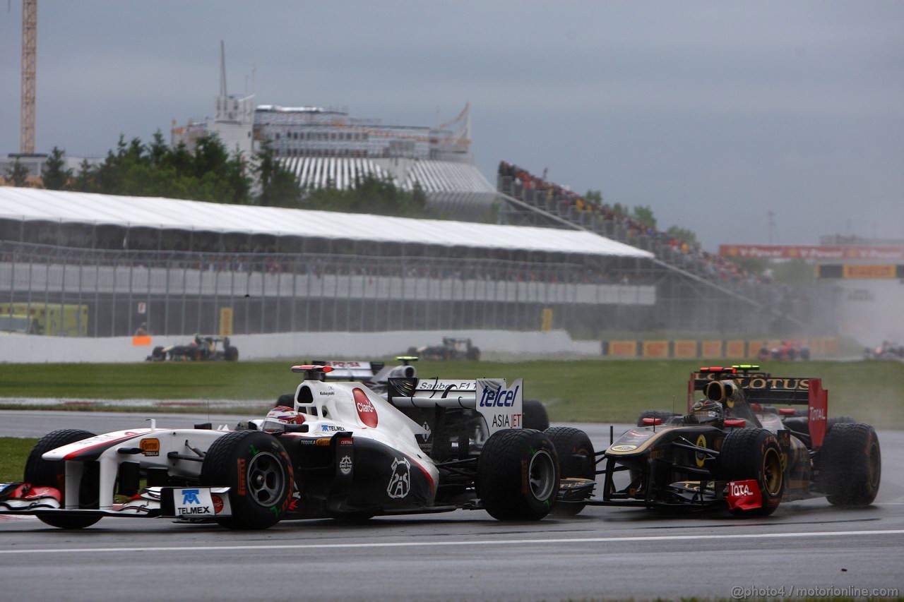 GP CANADA, 12.06.2011- Gara, Kamui Kobayashi (JAP), Sauber F1 Team C30 e Nick Heidfeld (GER) Lotus Renault GP R31  