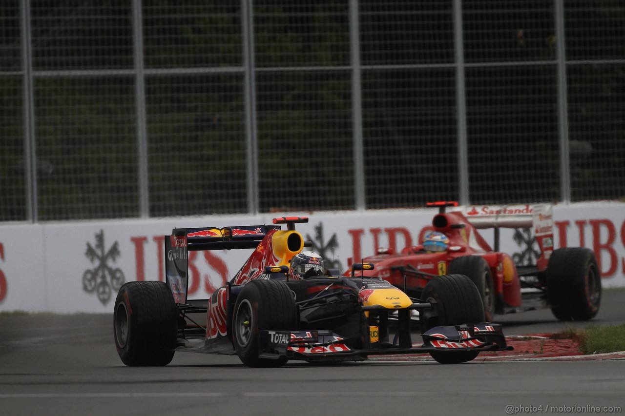 GP CANADA, 12.06.2011- Gara, Sebastian Vettel (GER), Red Bull Racing, RB7 e Fernando Alonso (ESP), Ferrari, F-150 Italia 