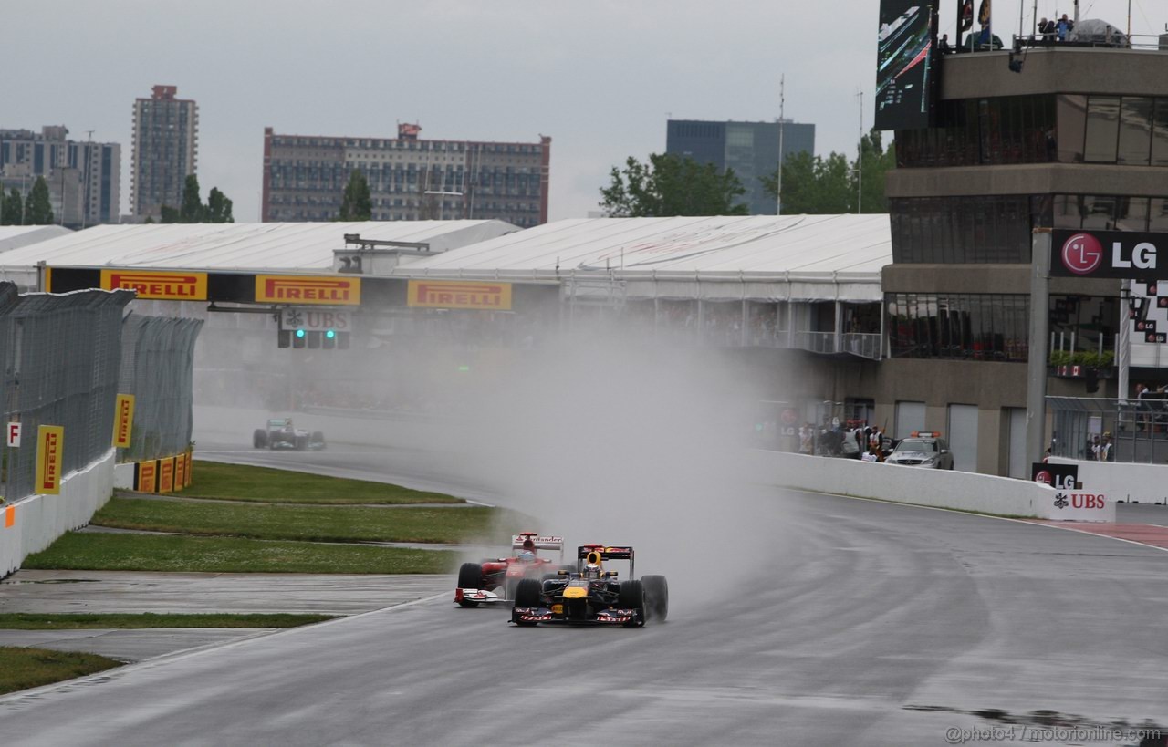 GP CANADA, 12.06.2011- Gara, Sebastian Vettel (GER), Red Bull Racing, RB7 e Fernando Alonso (ESP), Ferrari, F-150 Italia 