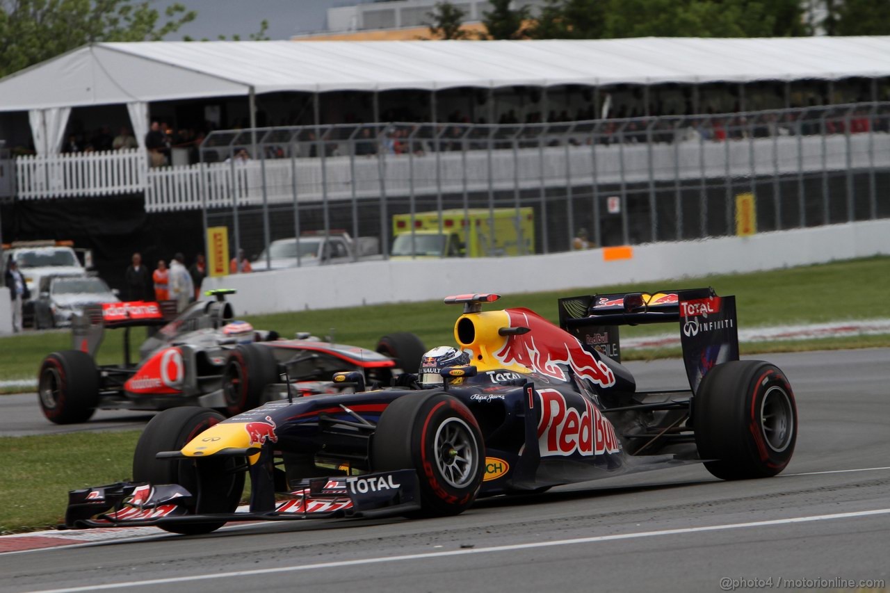 GP CANADA, 12.06.2011- Gara, Sebastian Vettel (GER), Red Bull Racing, RB7 davanti a Jenson Button (GBR), McLaren  Mercedes, MP4-26 