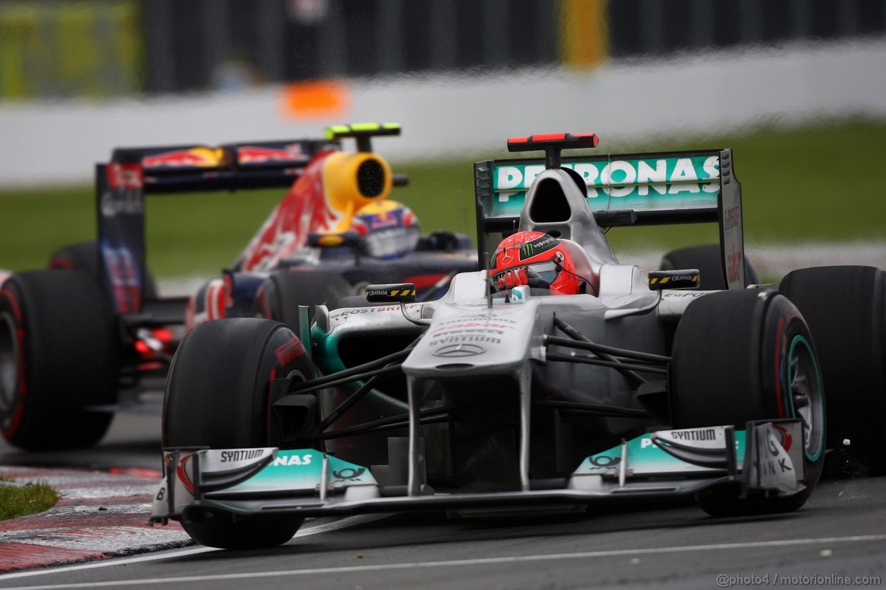 GP CANADA, 12.06.2011- Gara, Michael Schumacher (GER), Mercedes GP Petronas F1 Team, MGP W02 davanti a Mark Webber (AUS), Red Bull Racing, RB7 