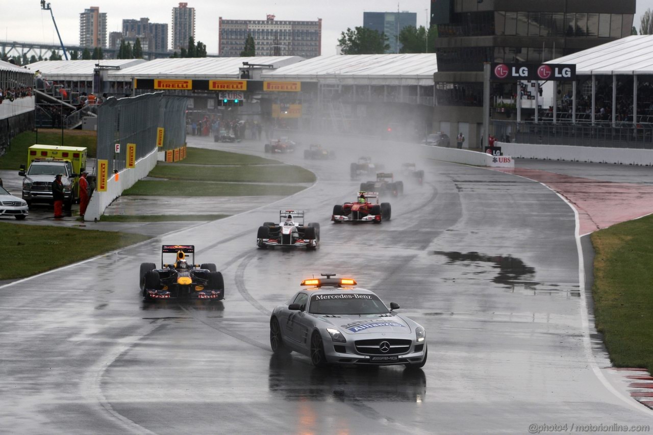 GP CANADA, 12.06.2011- Gara, The Safety car davanti a Sebastian Vettel (GER), Red Bull Racing, RB7 