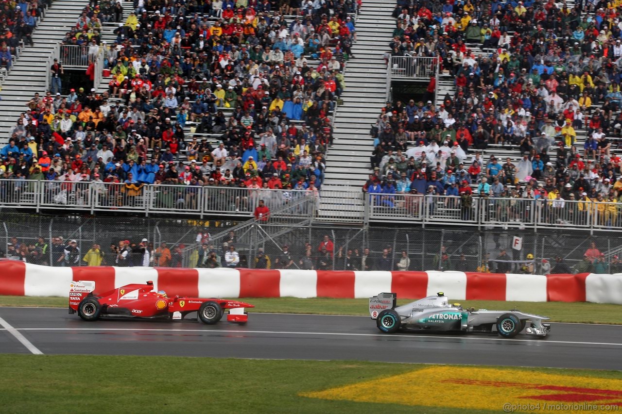 GP CANADA, 12.06.2011- Gara, Fernando Alonso (ESP), Ferrari, F-150 Italia e Nico Rosberg (GER), Mercedes GP Petronas F1 Team, MGP W02 