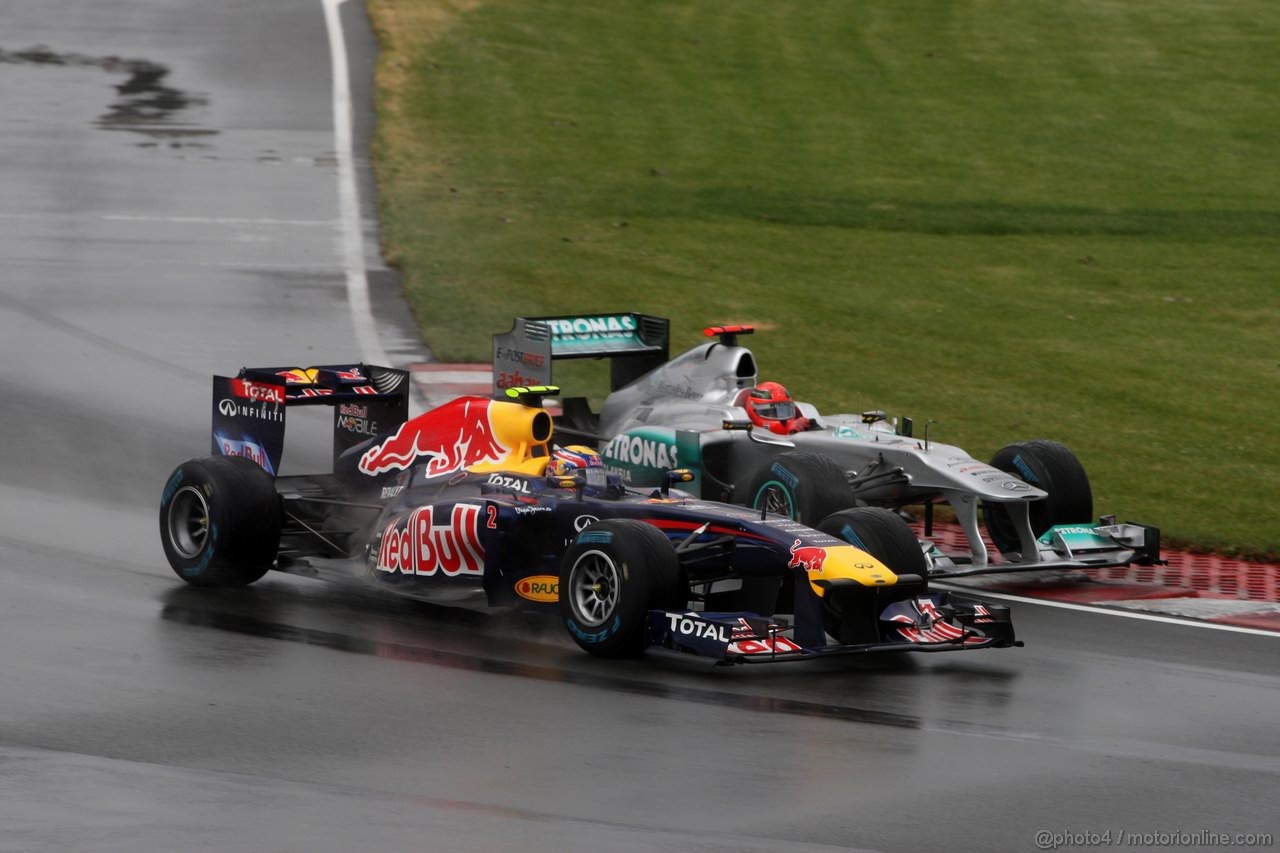 GP CANADA, 12.06.2011- Gara, Mark Webber (AUS), Red Bull Racing, RB7 e Michael Schumacher (GER), Mercedes GP Petronas F1 Team, MGP W02 