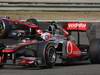 GP CINA, 17.04.2011- Gara, Jenson Button (GBR), McLaren Mercedes, MP4-26 davanti a Lewis Hamilton (GBR), McLaren Mercedes, MP4-26